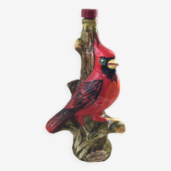 Garnier decorative bottle with red cardinal bird pattern