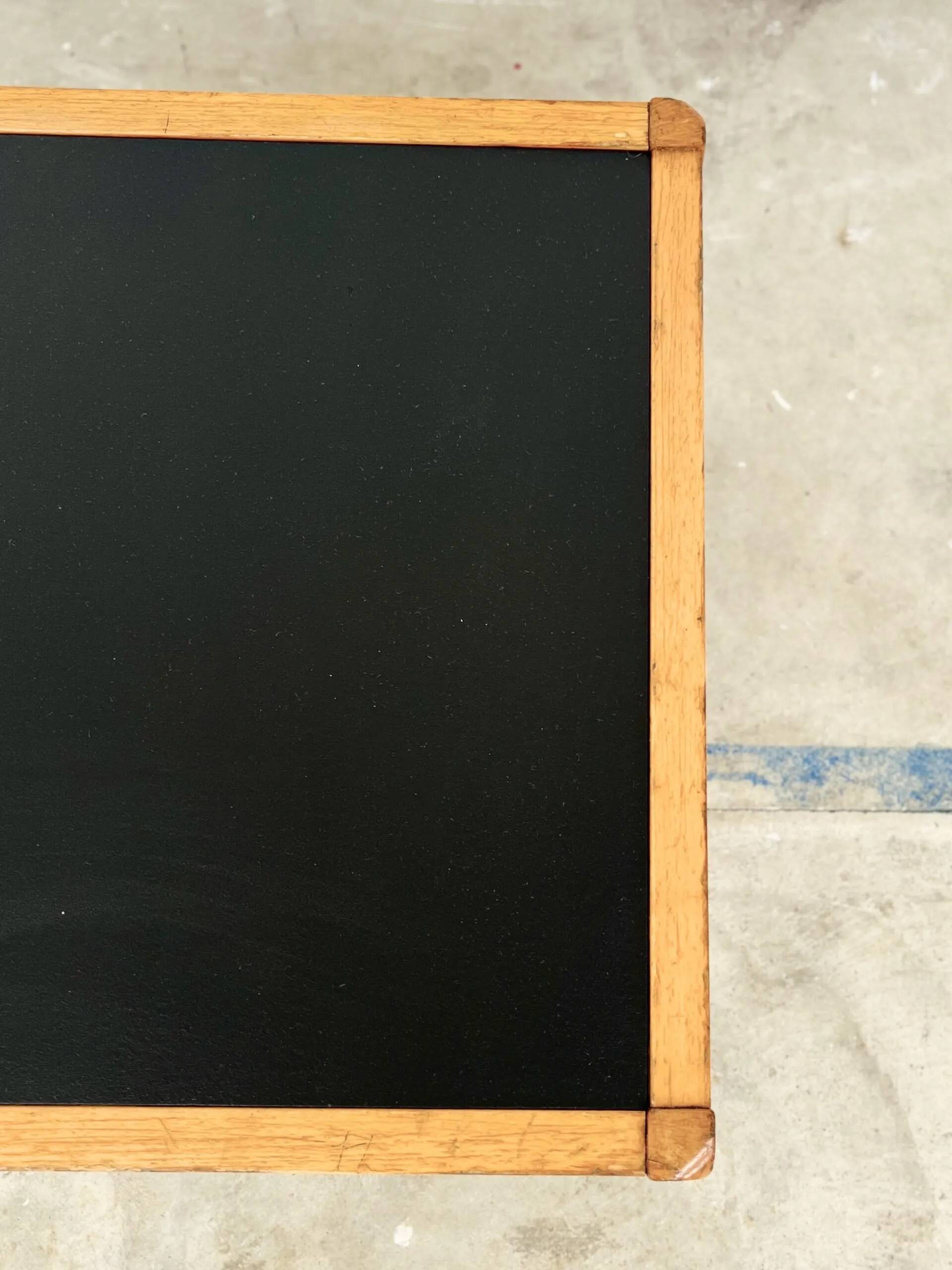 Baumann coffee table with black medium-density top