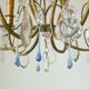 Antique French chandelier cage in gilded bronze and crystal, with blue pendants.