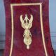 Pair of plaster bases imitating porphyry and gilded bronze circa 1980.