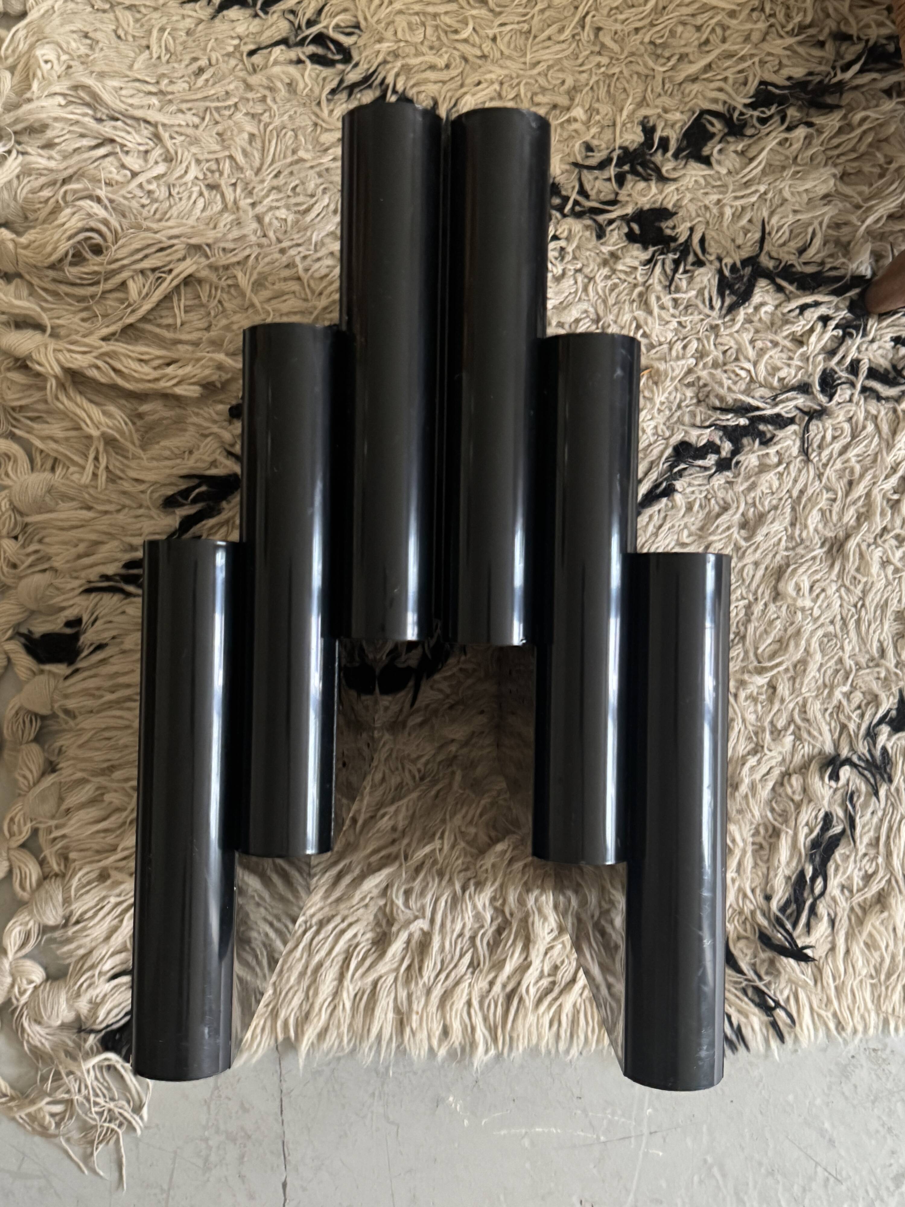 Large black magazine rack by Giotto Stoppino for Kartell, Italy 1970.
