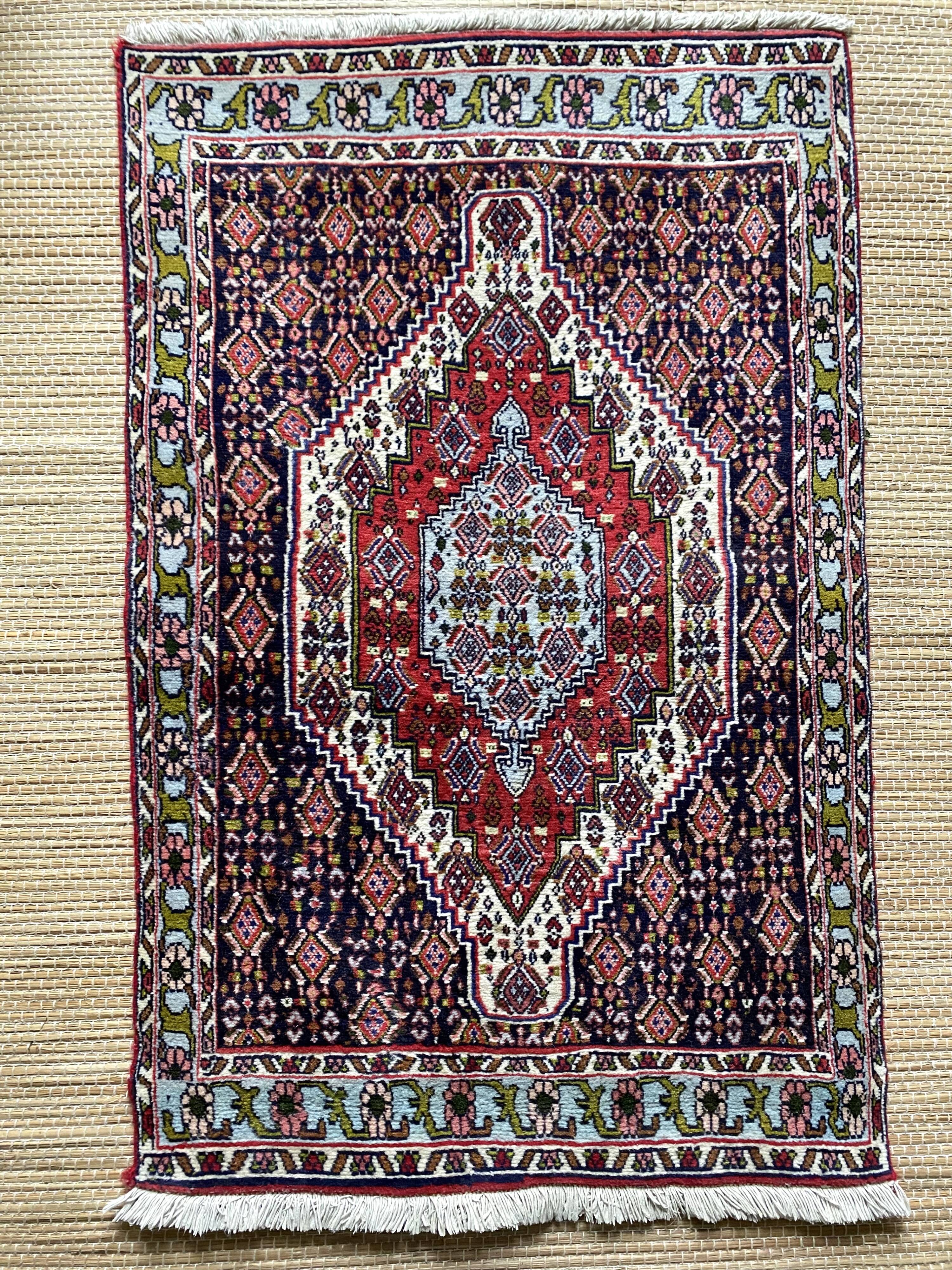 Persian wool carpet 69x113