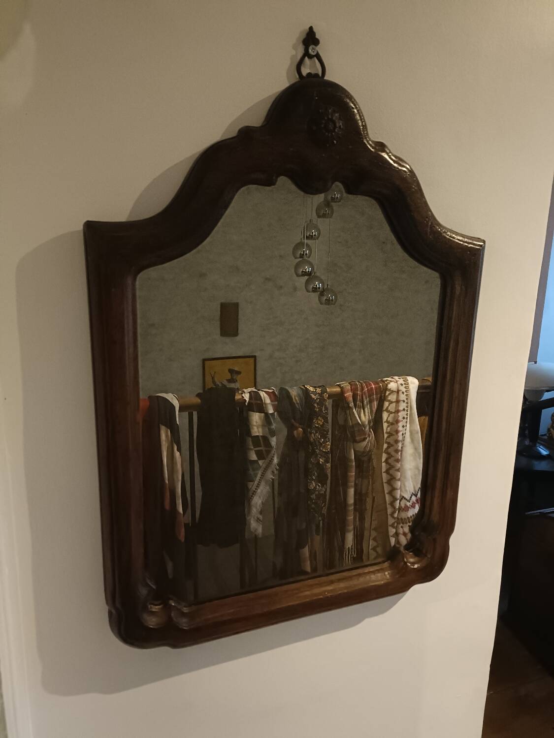 Antique shaped mirror, wood and bronze