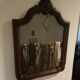 Antique shaped mirror, wood and bronze
