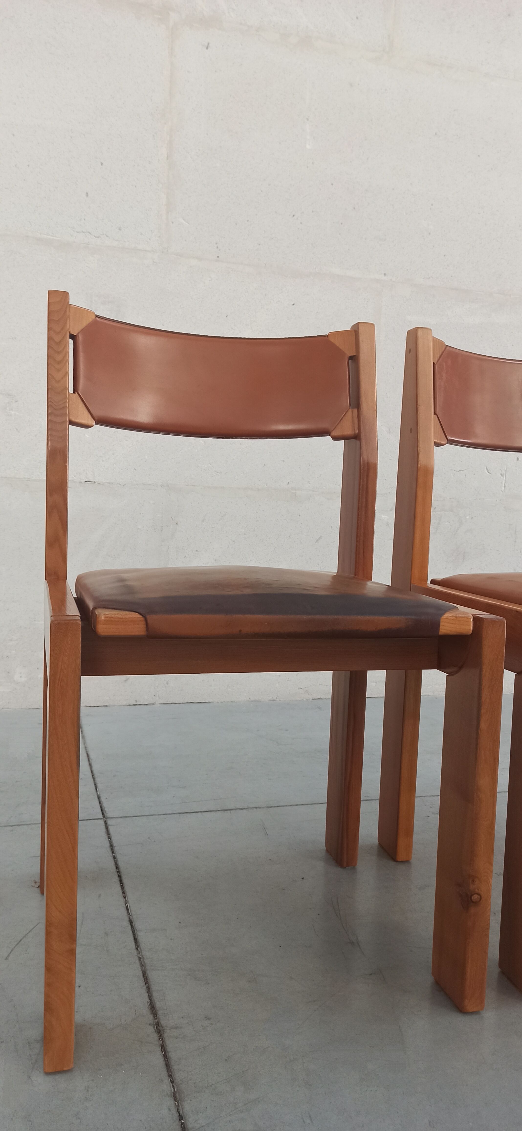 Elm and leather chairs, 80