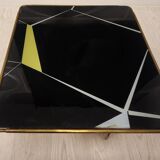 Table basse en laiton et verre