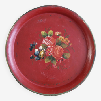 Round tray in Napoleon III painted sheet metal, floral decoration, antique red and gold background