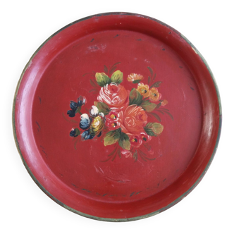 Round tray in Napoleon III painted sheet metal, floral decoration, antique red and gold background