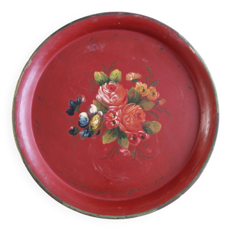 Plateau rond en tôle peinte Napoléon III  , décor floral, fond rouge antique et or