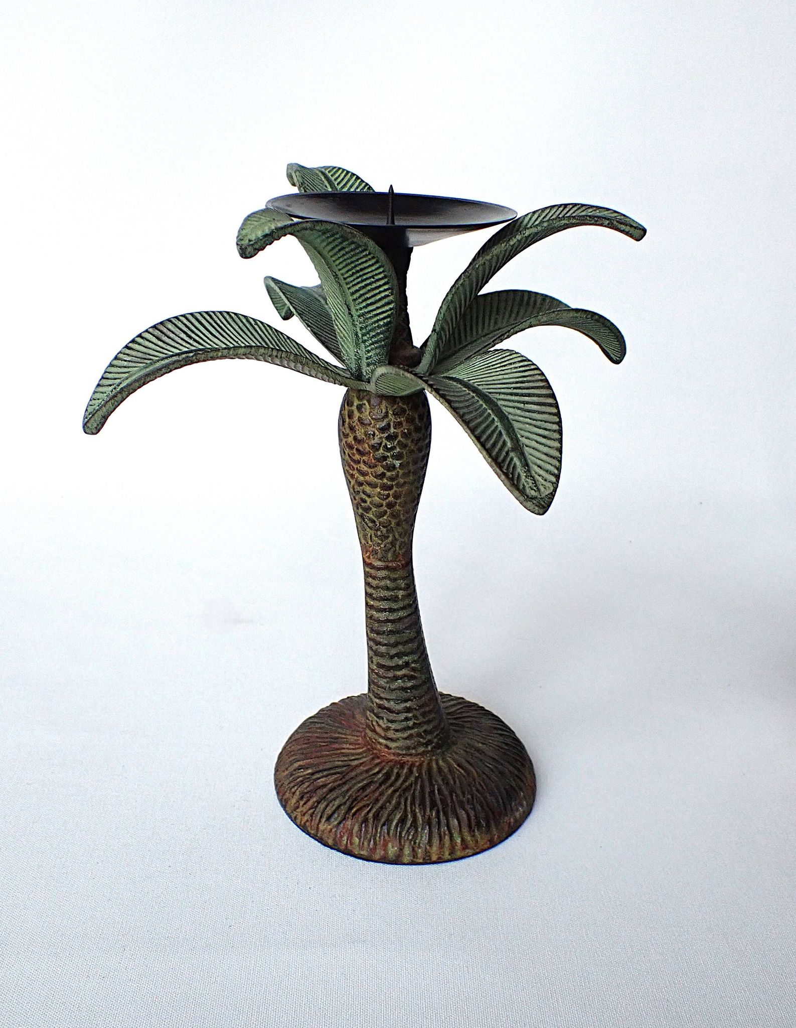 Antique palm tree-shaped candlestick in patinated metal