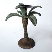 Antique palm tree-shaped candlestick in patinated metal