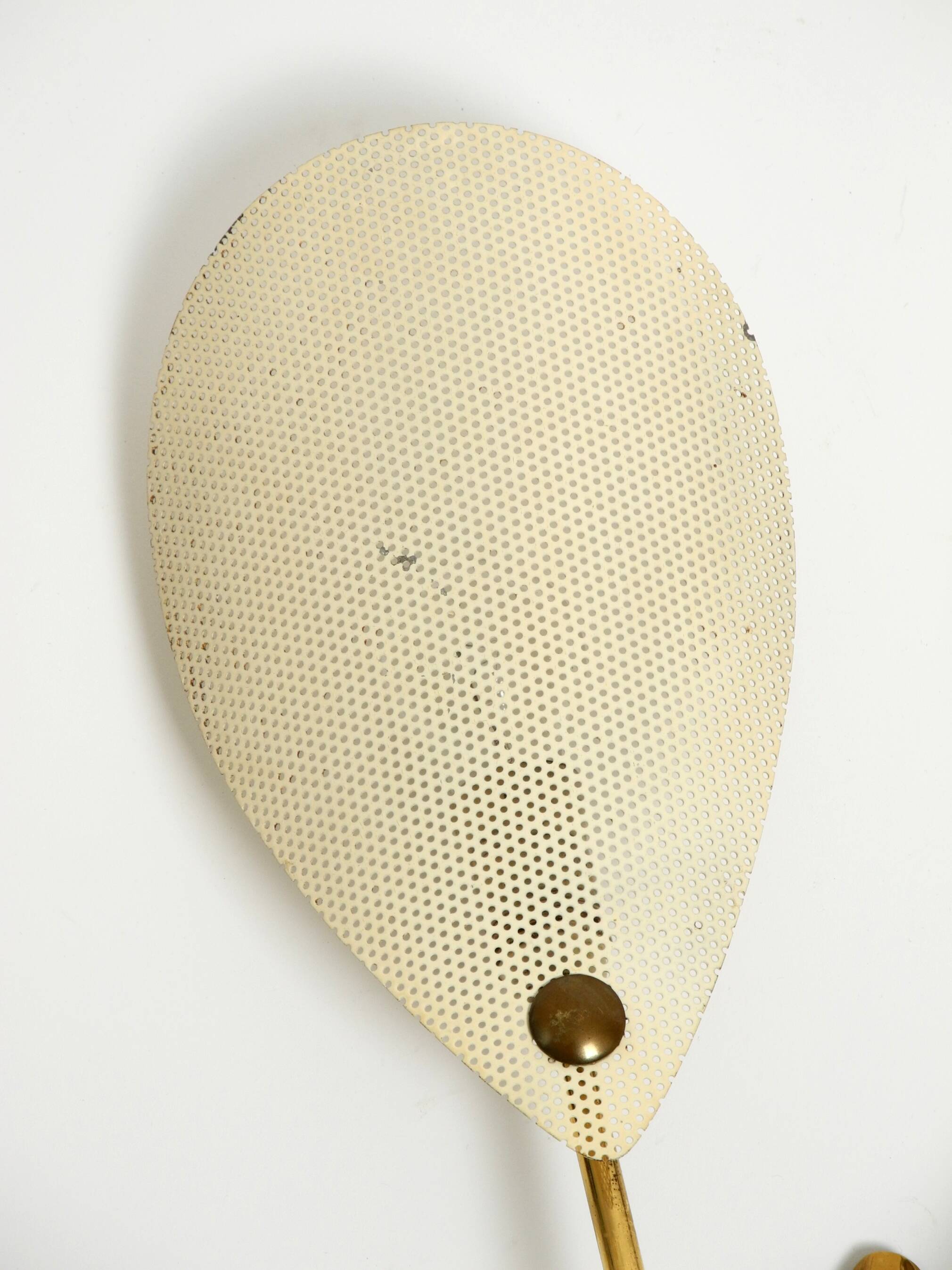 Mid Century Modern brass wall lamp with perforated metal sheet lampshades