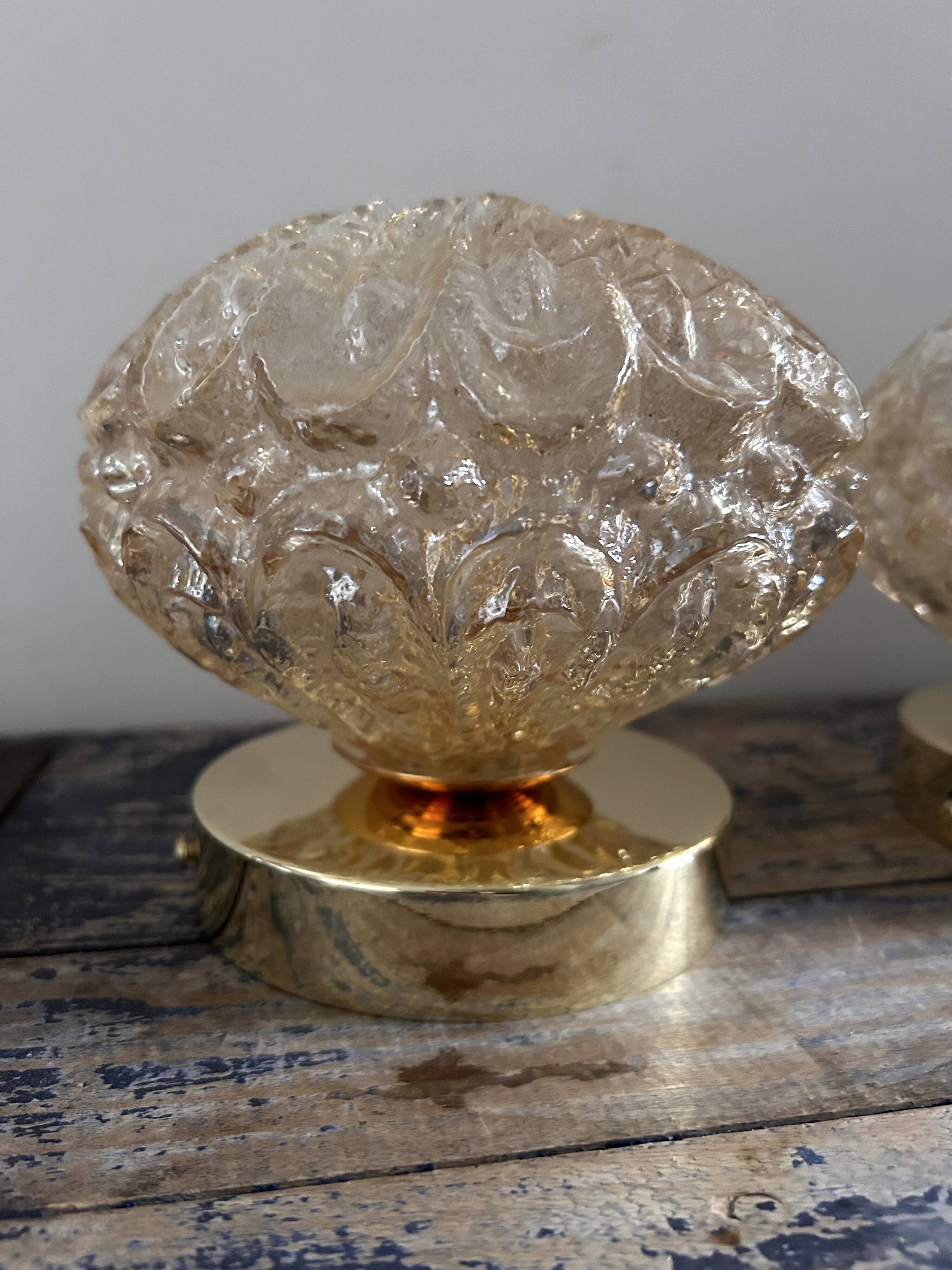 Set of two vintage amber glass wall lights