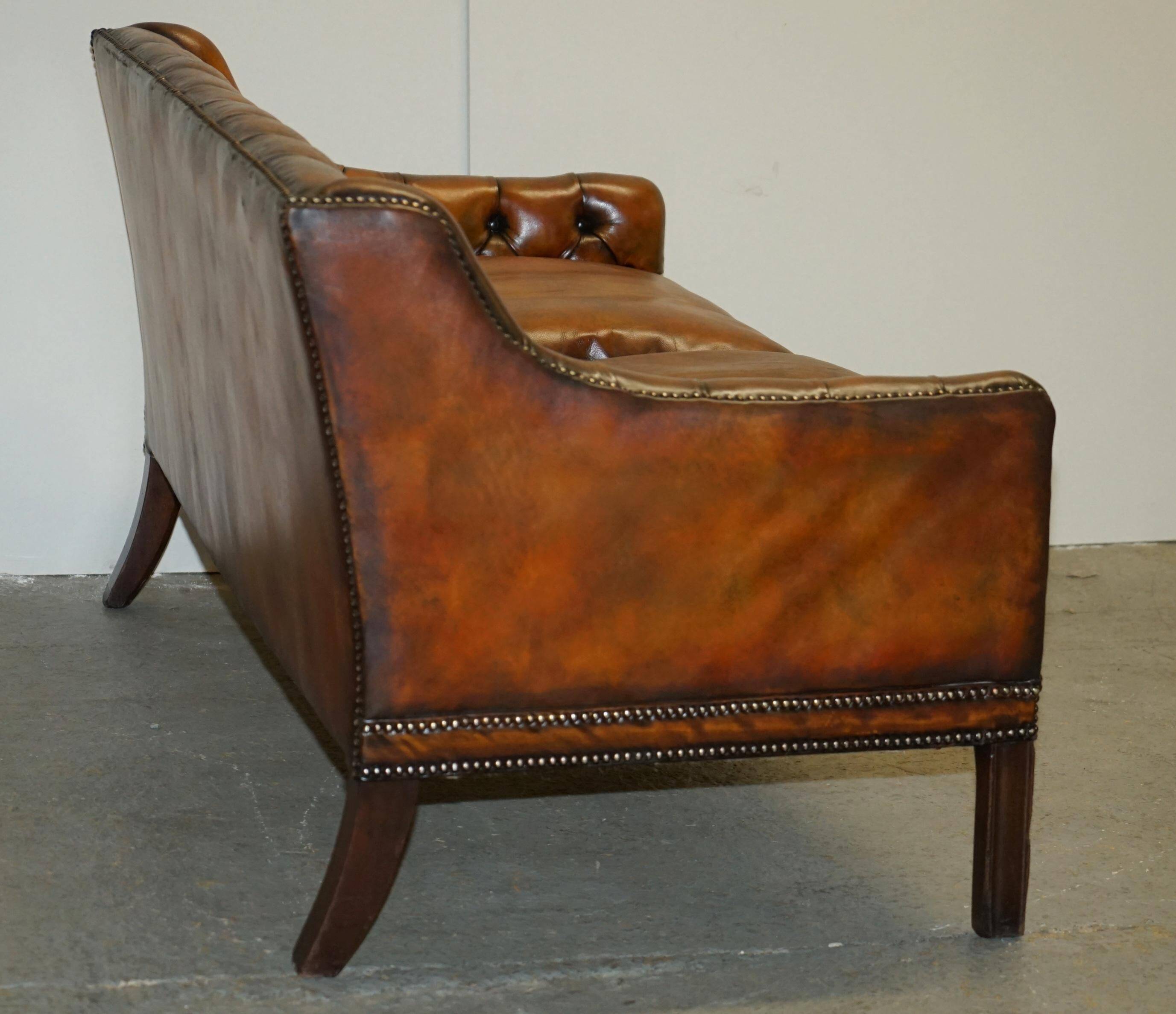 Restored leather Chesterfield sofa in Regency style
