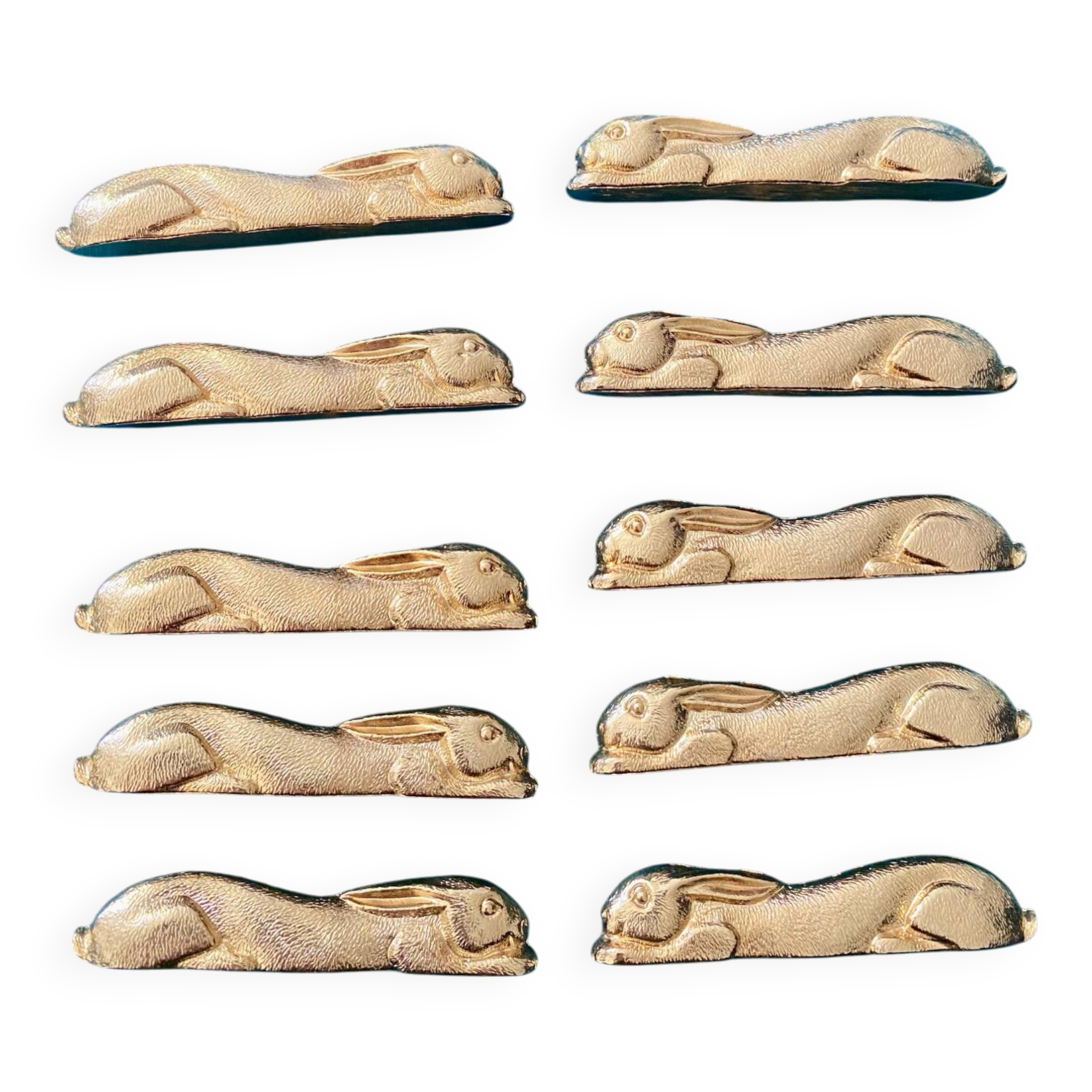 10 rabbit-shaped gold knife holders