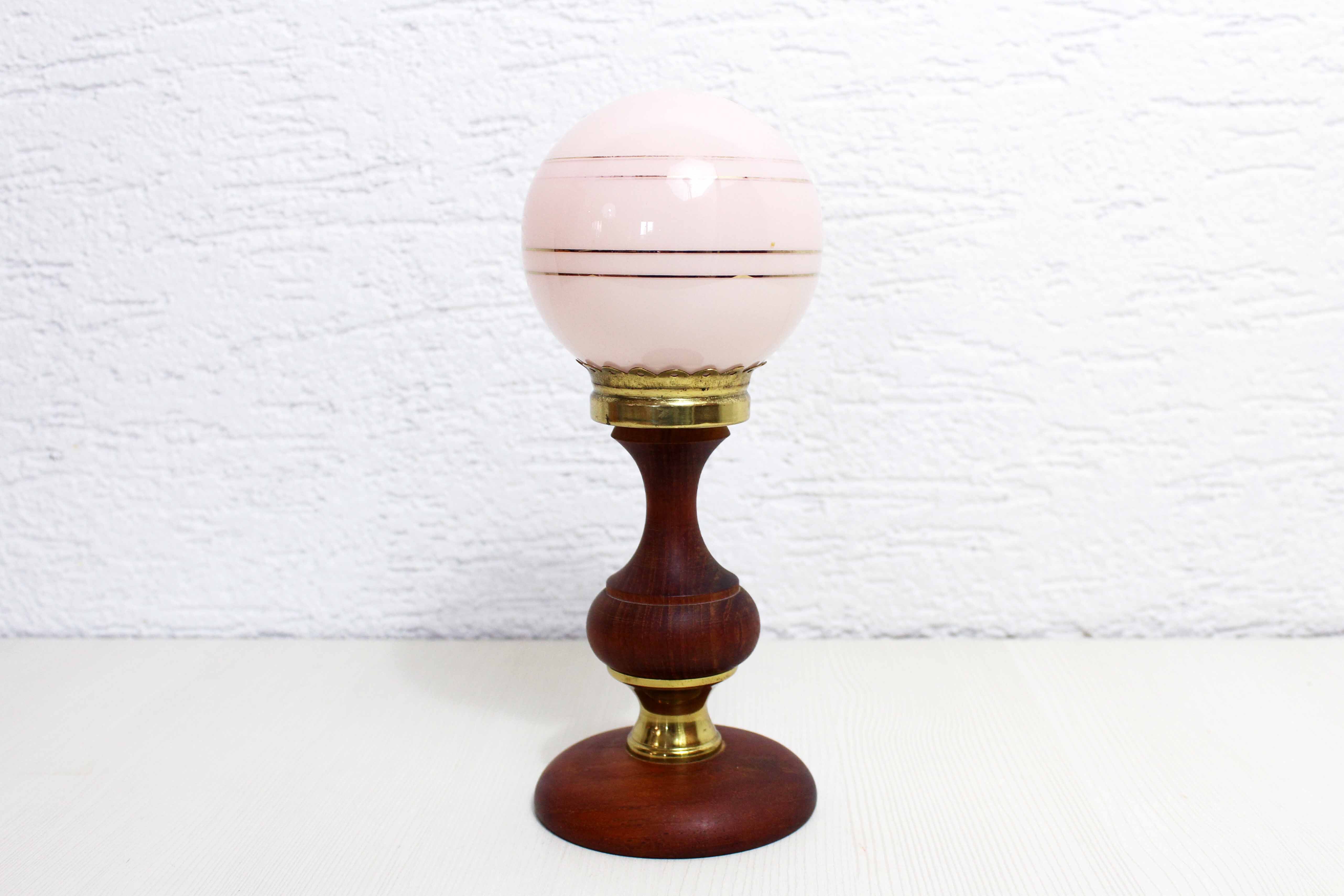 Teak table lamp and pink glass