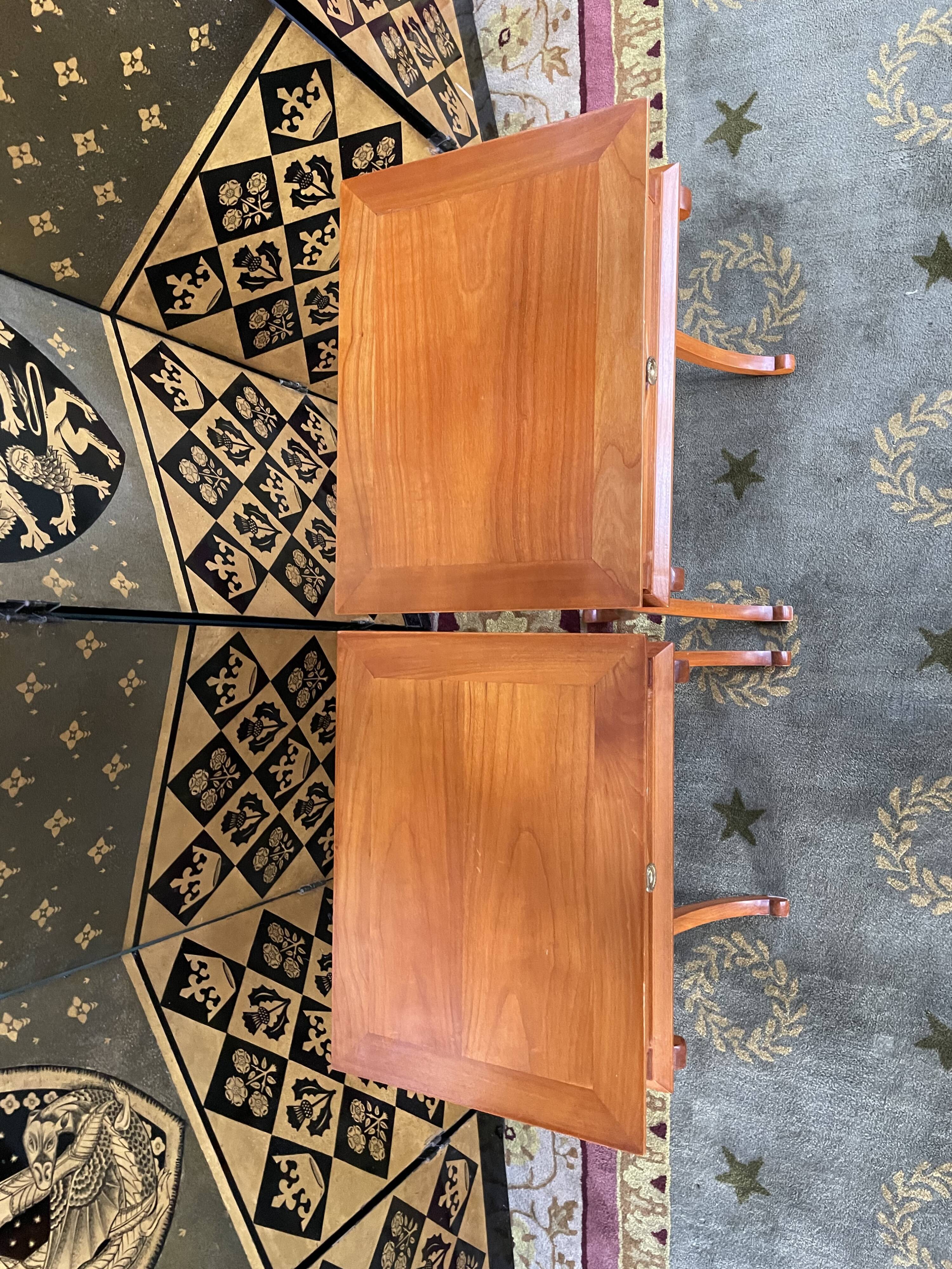 Pair of Directoire style winding bedside tables