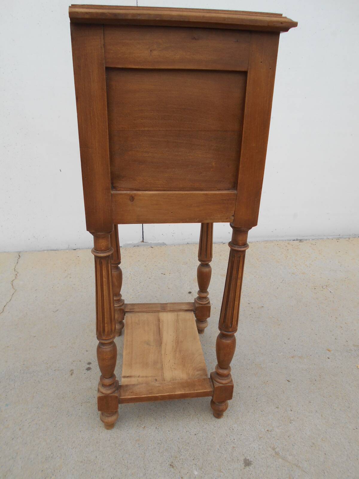 Antique bedside table, made of solid walnut.