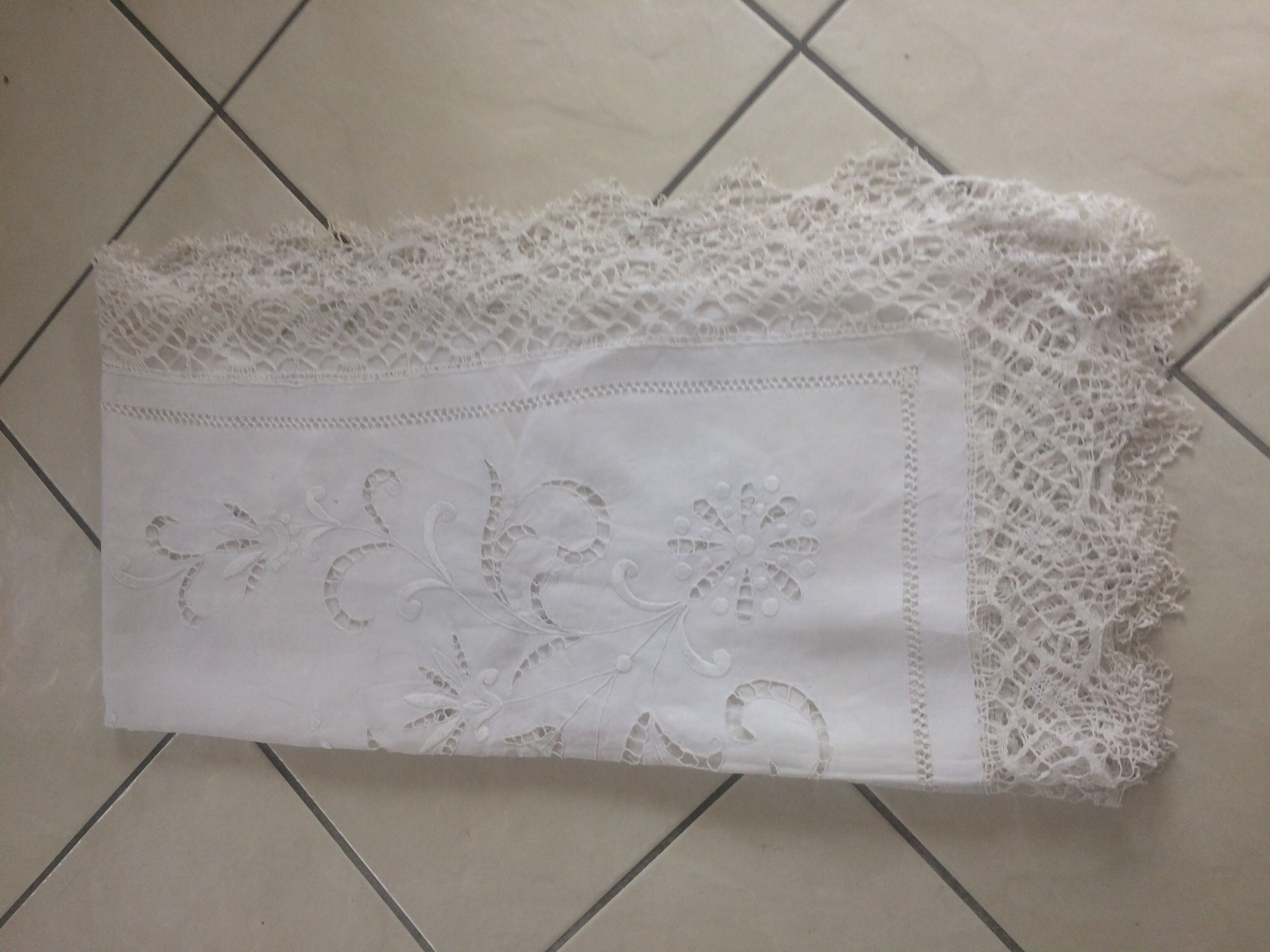 Old tablecloth with embroidery and handmade lace