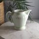 Green ceramic milk jug