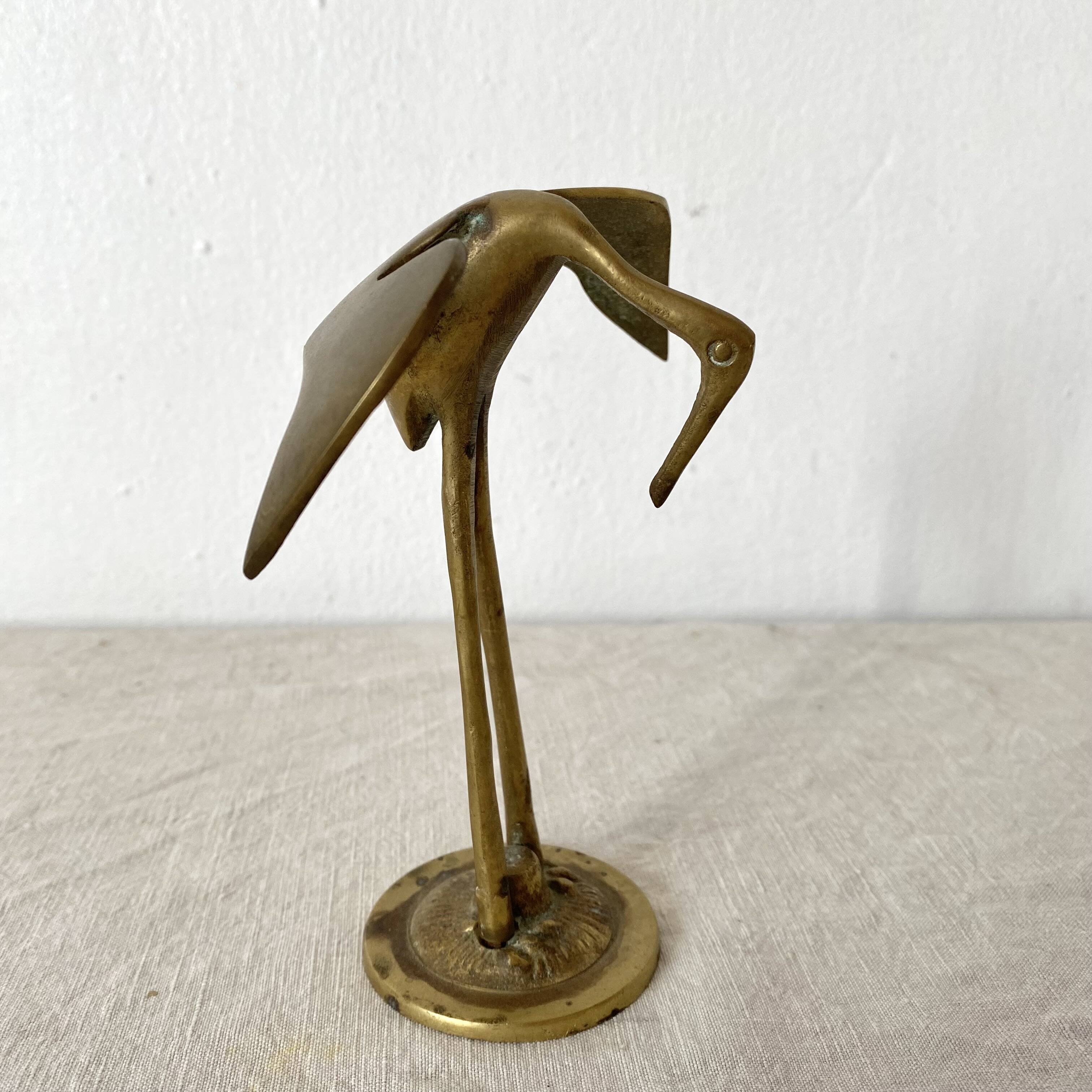 Golden brass bird