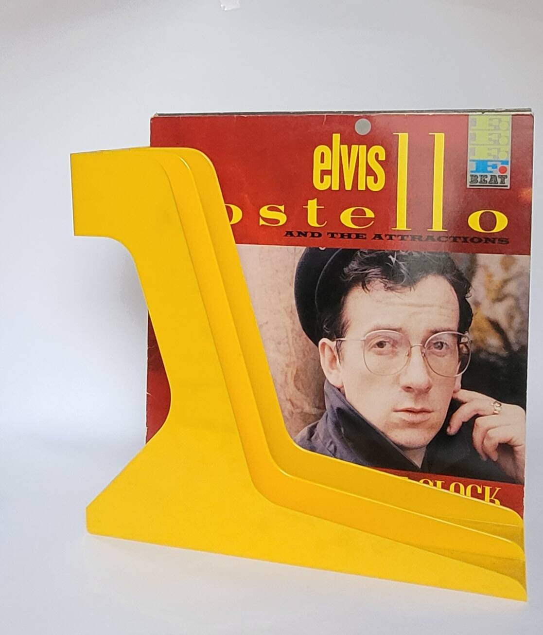 Yellow plastic vinyl racks from the 70s