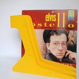 Yellow plastic vinyl racks from the 70s