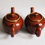2 brown glazed ceramic teapots