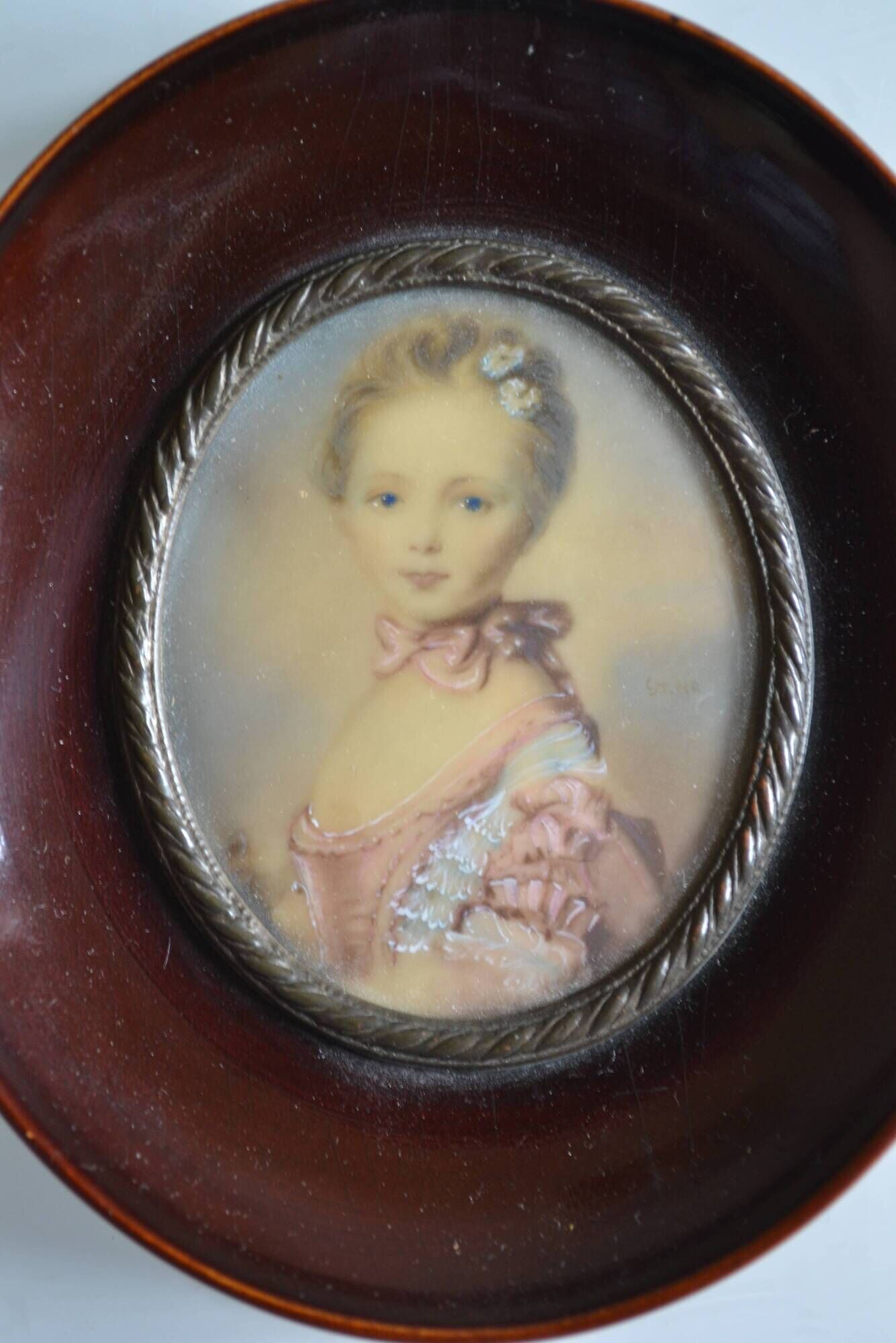 Miniature portrait of a young girl, framed and under glass