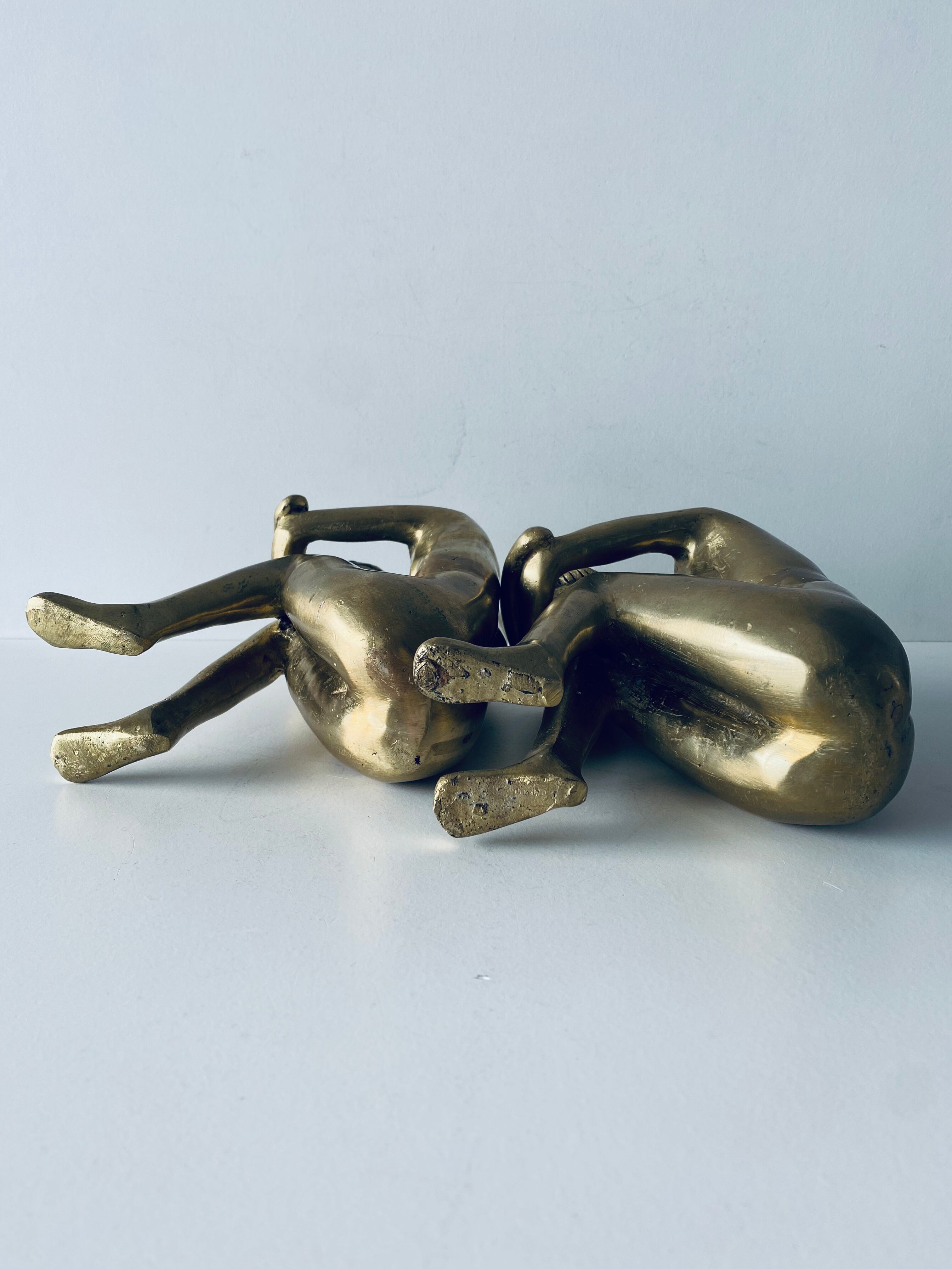 Couple carved in gilded bronze