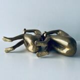 Couple carved in gilded bronze