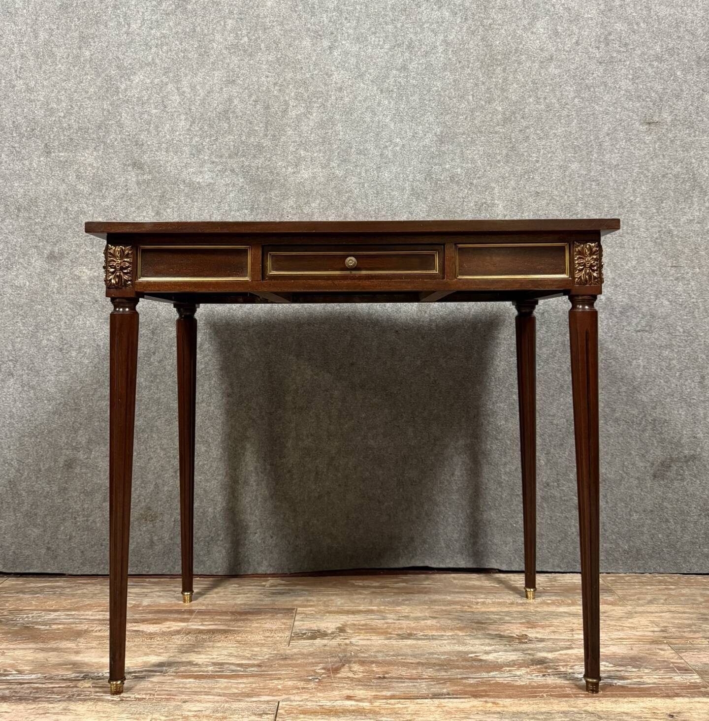 Parisian Louis XVI style desk in mahogany and gilded bronze
