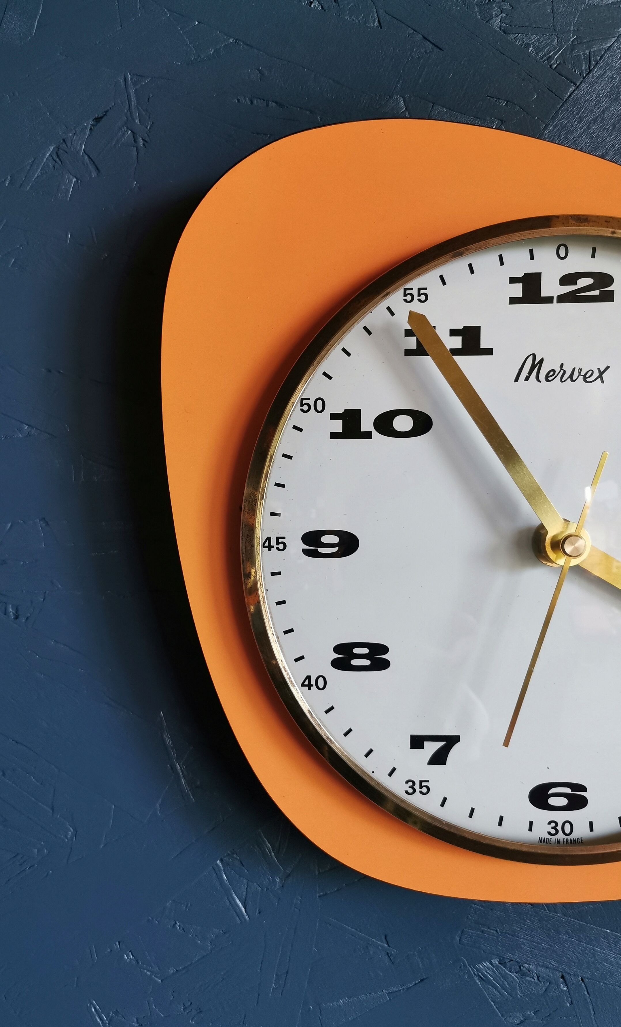 Vintage formica clock asymmetrical silent wall clock "Mervex orange"