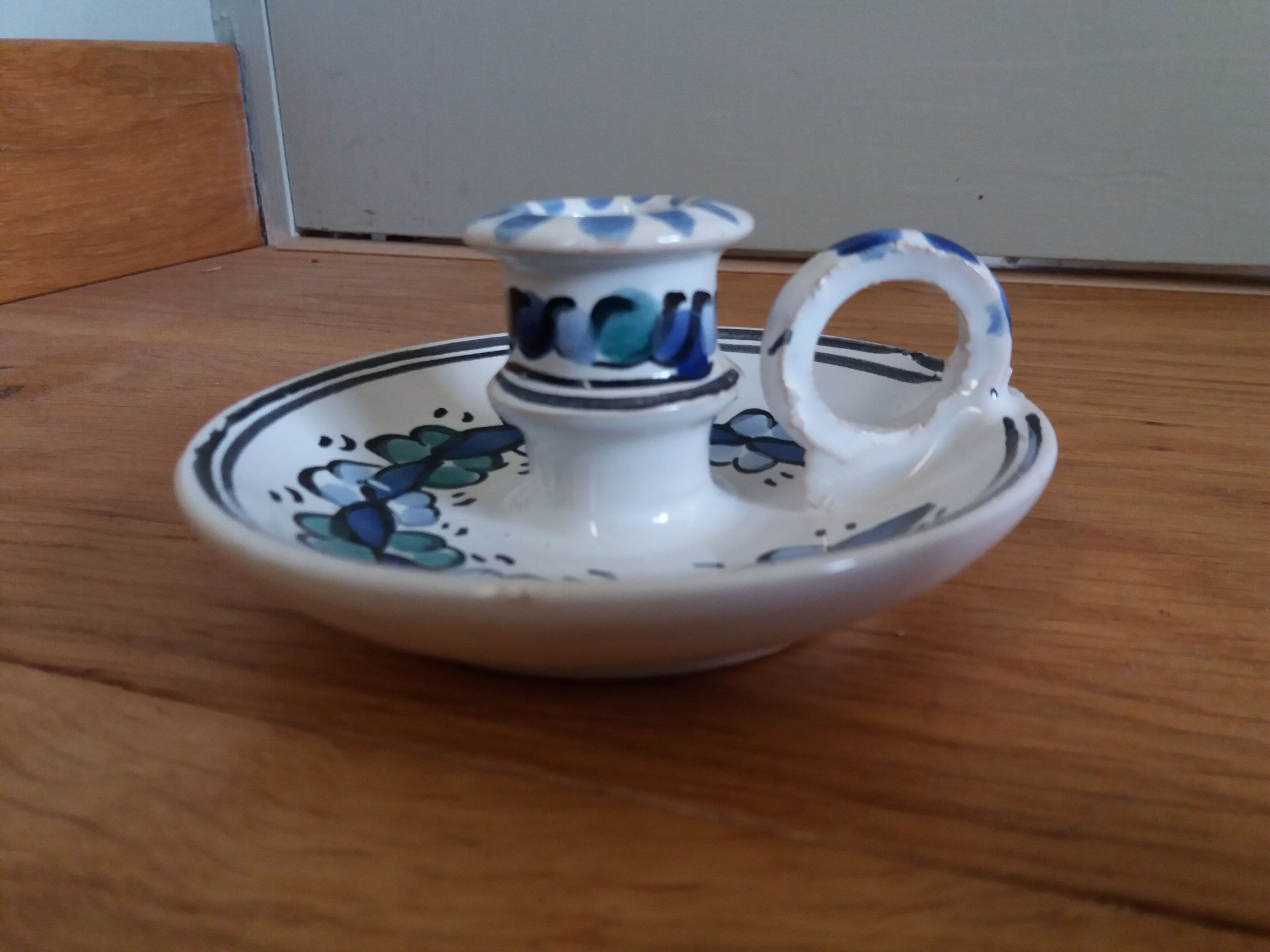 Cellar rat candle holder