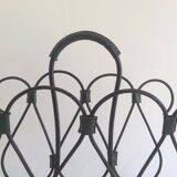 Magazine rack in leather and black lacquered metal. Attributed to Jacques Adnet