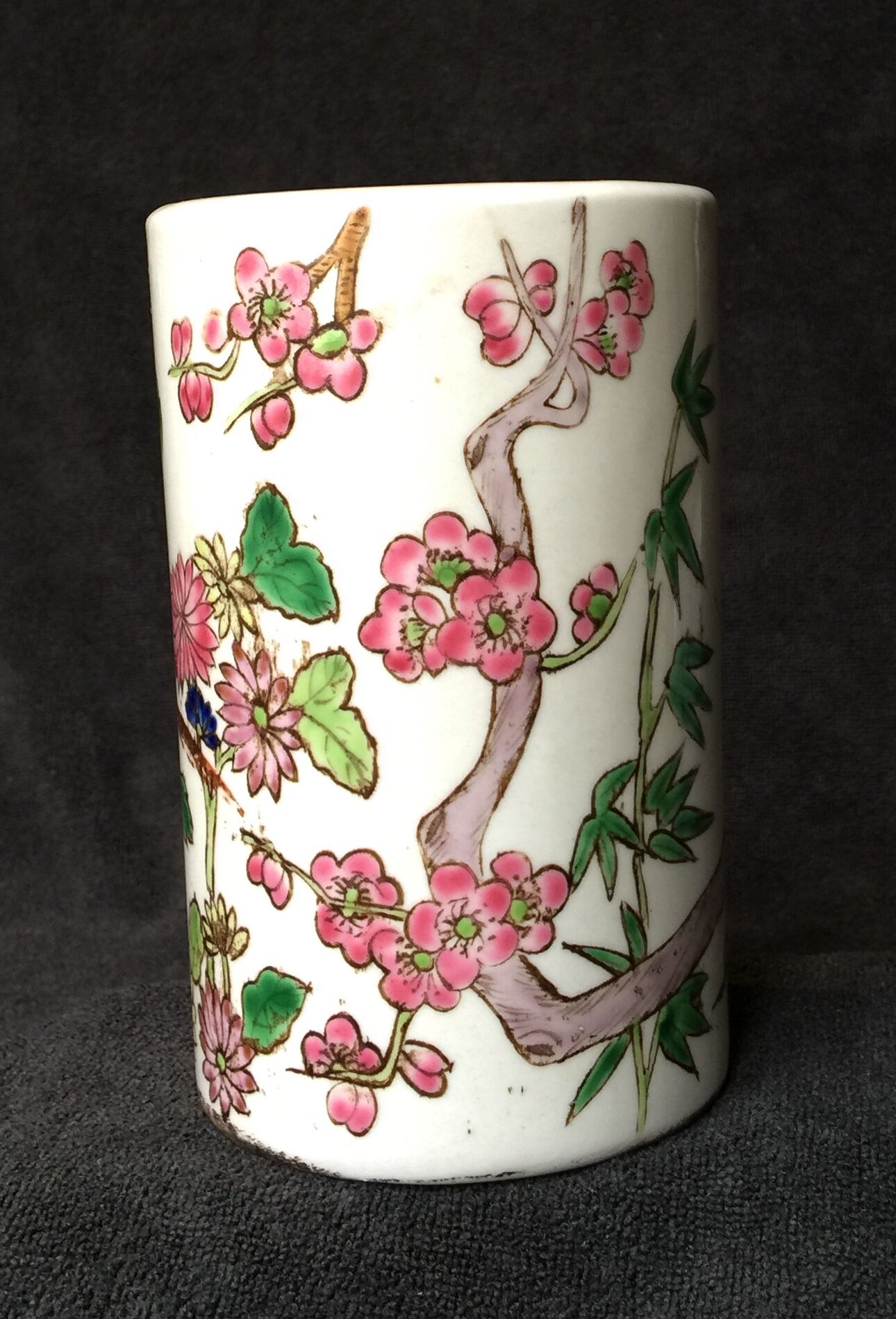Small vase roll decoration birds branches of cherry blossoms and flowers