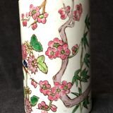 Small vase roll decoration birds branches of cherry blossoms and flowers