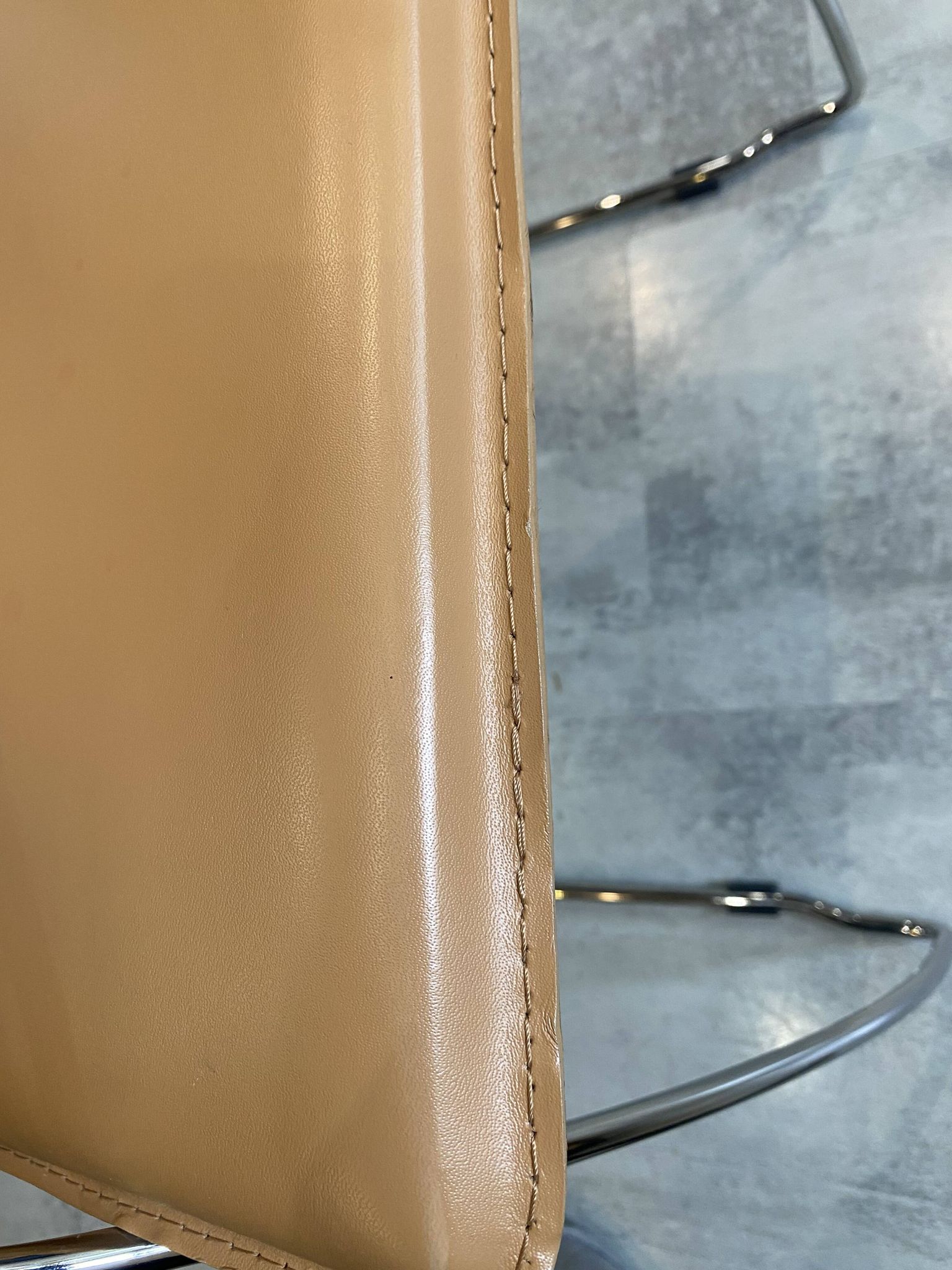 1 Linda armchair chair by Arrben in camel brown leather with a chrome steel frame.