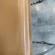 1 Linda armchair chair by Arrben in camel brown leather with a chrome steel frame.