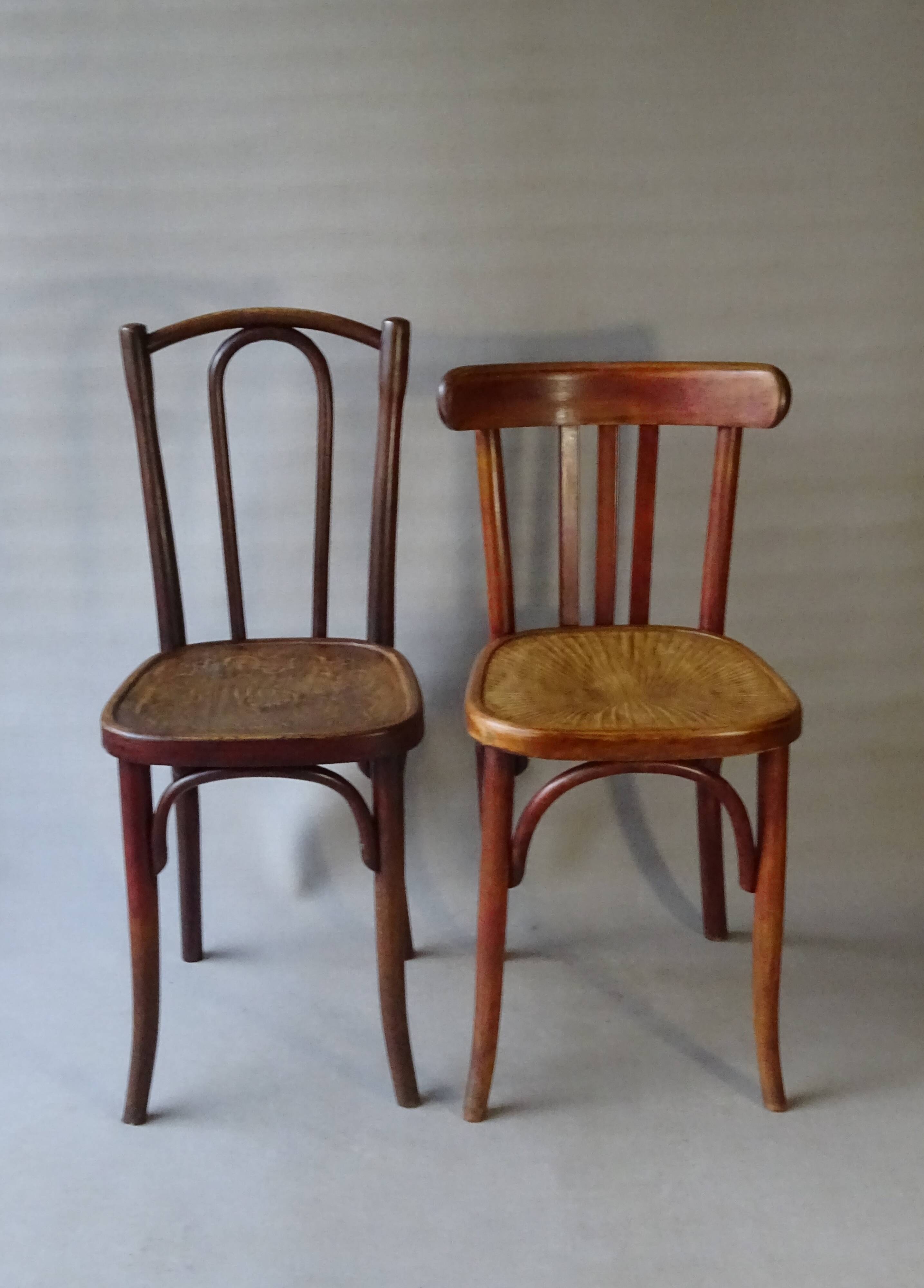 Set of 36 mismatched Bistrot chairs, 1920 to 1950, wooden seats.