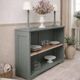 Vintage workshop furniture transformed into a re-enchanted bookshelf in smoky green.