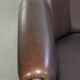 Unique sheepskin 3-seater sofa with deep colours and a distinctive design