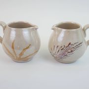 Pair of ceramic milk jugs signed La Roue Vallauris