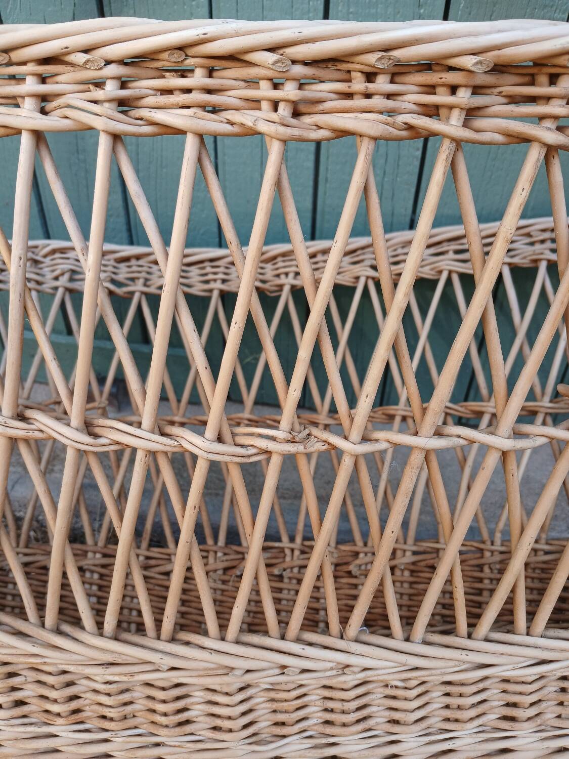 Antique wicker magazine rack