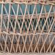 Antique wicker magazine rack