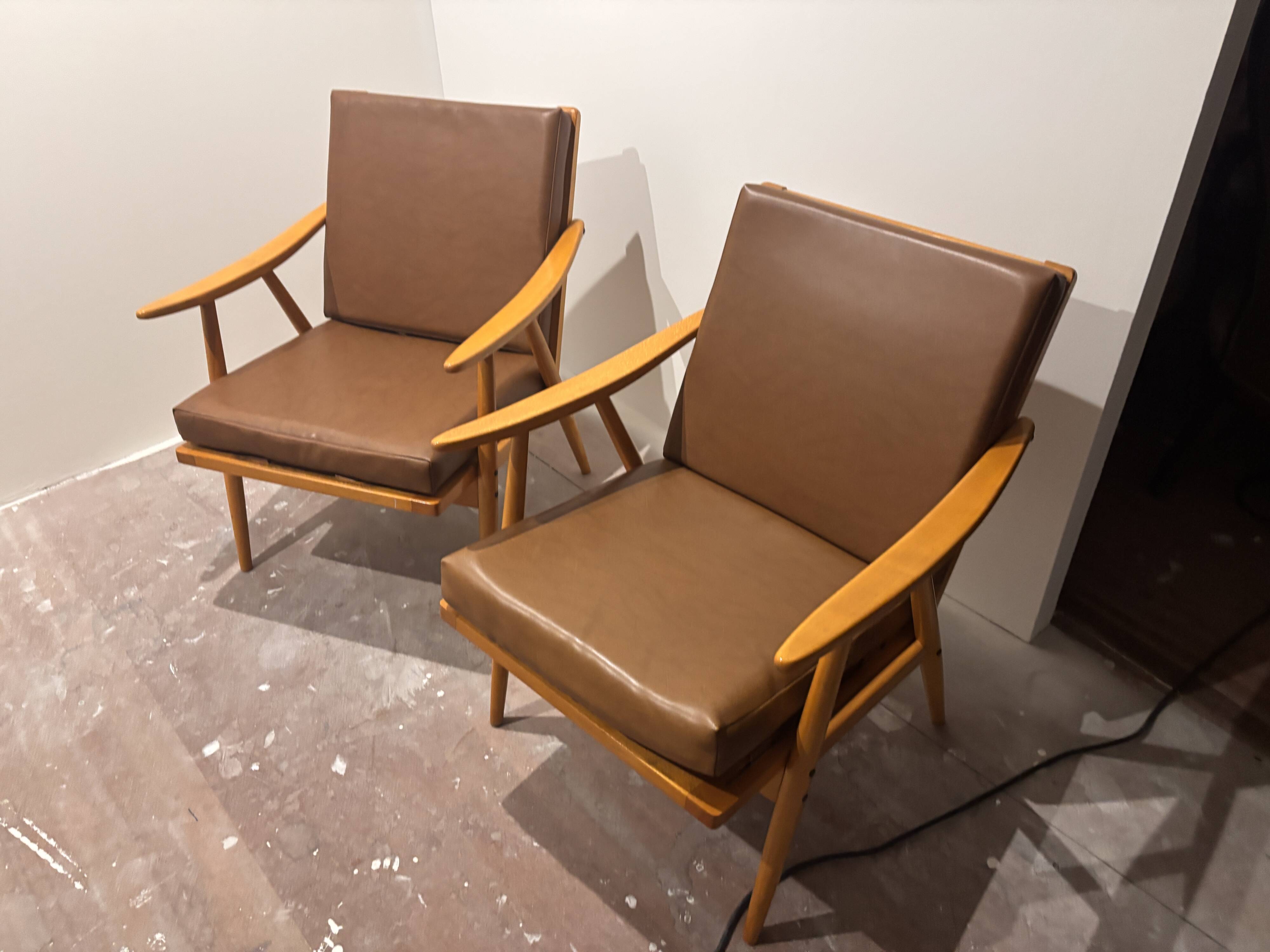 Pair of vintage armchairs with compass legs, "Boomerang" model by THO editions.