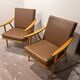 Pair of vintage armchairs with compass legs, "Boomerang" model by THO editions.