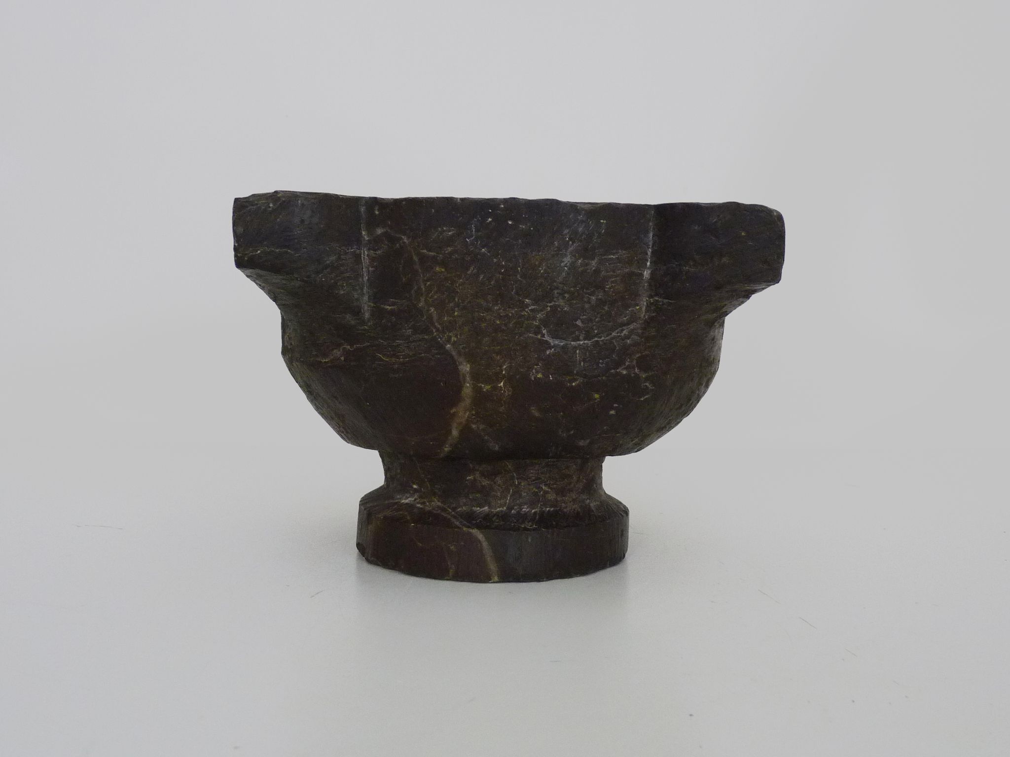 Old black marble apothecary mortar