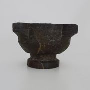 Old black marble apothecary mortar