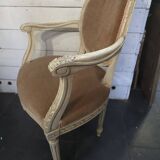 Louis XVI style bergère armchair in patinated wood